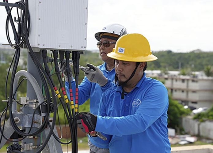 IT&E technicians working on a cell site